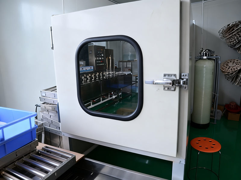 material transfer port to ultrasonic cleaning room